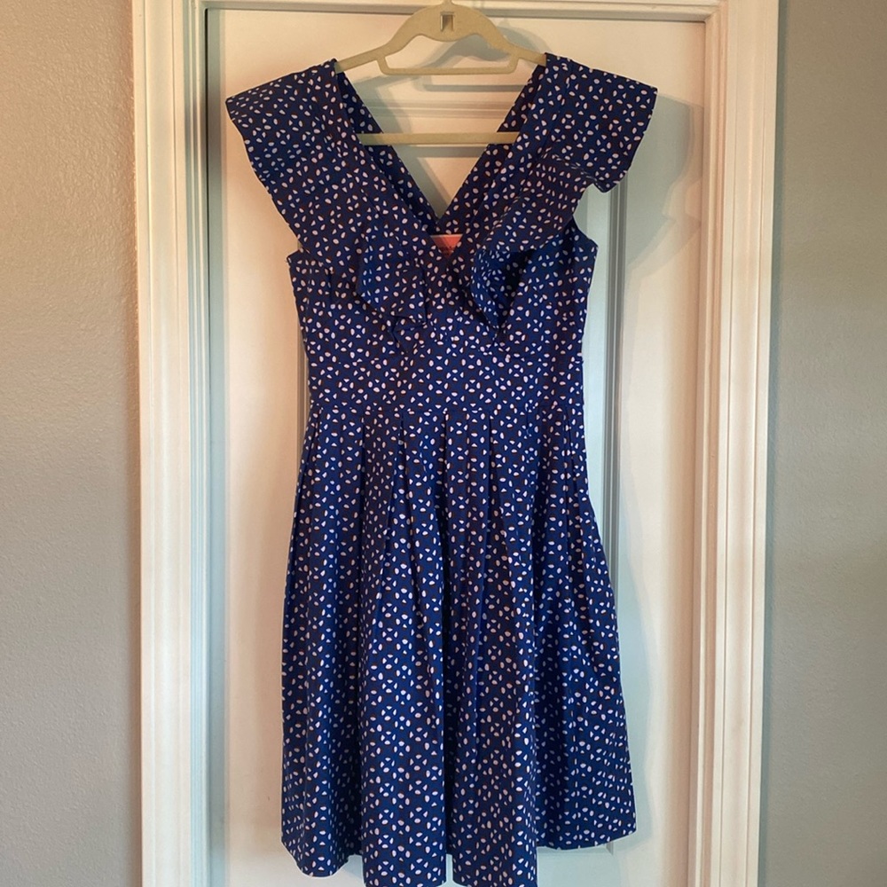 Kate Spade purple printed dress with pockets and keyhole detail in back.